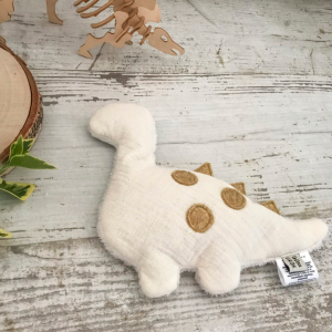 UN2CROIX – Bouillotte dino écru