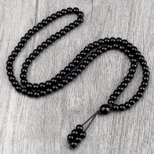 Pendentif perle noire